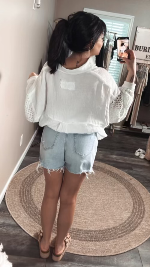 High-Rise Distressed Denim Shorts